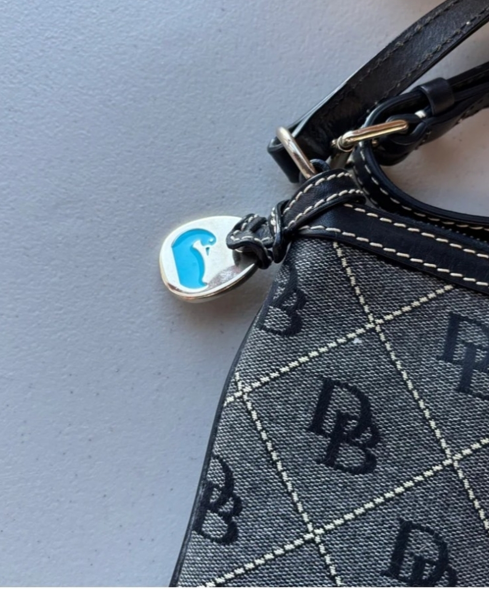 Dooney & Bourke Signature Crossbody Bag. Adjustable leather strap - Picture 5 of 9